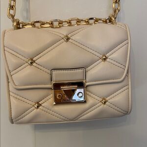 Michael kors 
Elegant Cream Quilted Chain Bag